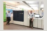Conlin’s adds Xerox Iridesse production press in North America Bill Conlin (left) and Bill Conlin Jr. (right) stand alongside their newly installed Xerox Iridesse Production Press.