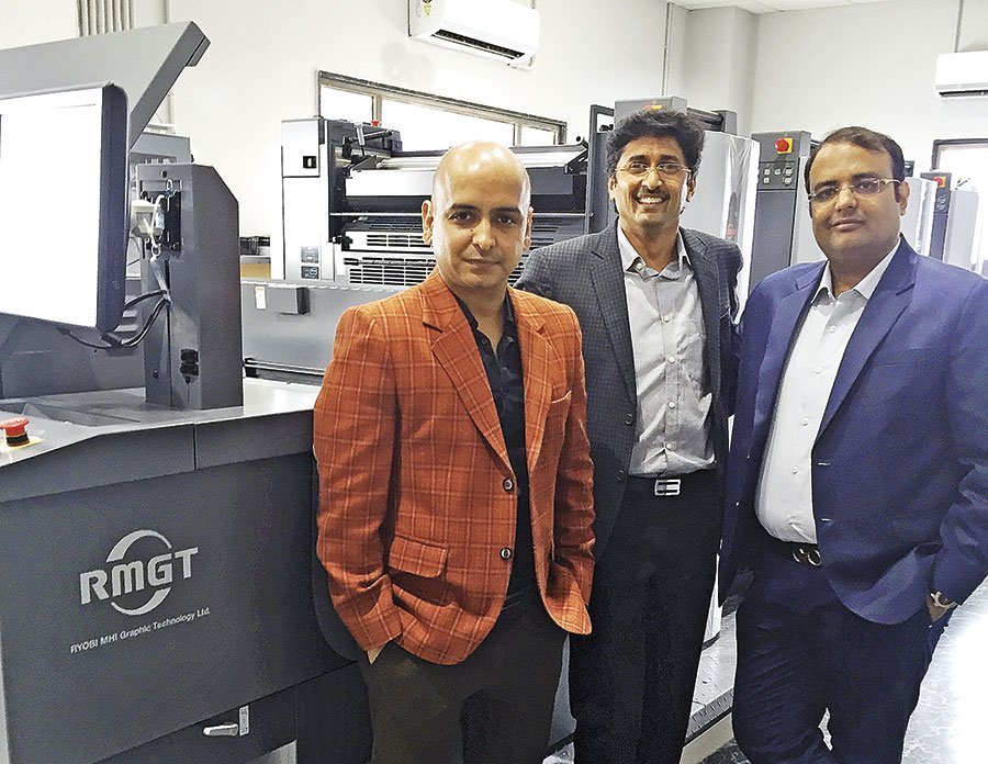 L-R: Rajesh Sharma, Hemant Seth and Amit Agarwal with the new RMGT 4-color sheetfed offset press at Prime Scan in Udaipur