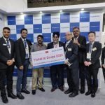 Polykam Offset buys third Komori press at Pamex 2020 Komori team with Jasveer Singh of Polykam Offset at Pamex 2020