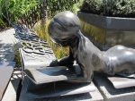 Coronavirus impact on trade fairs – an update Statue of young book reader