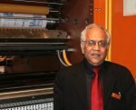 VK Dhir July 1953 – May 2021 VK Dhir at the Printpack 2011 exhibition at Pragati Maidan with the Perfect Rotary 4-Hi tower press unit. Photo IPP