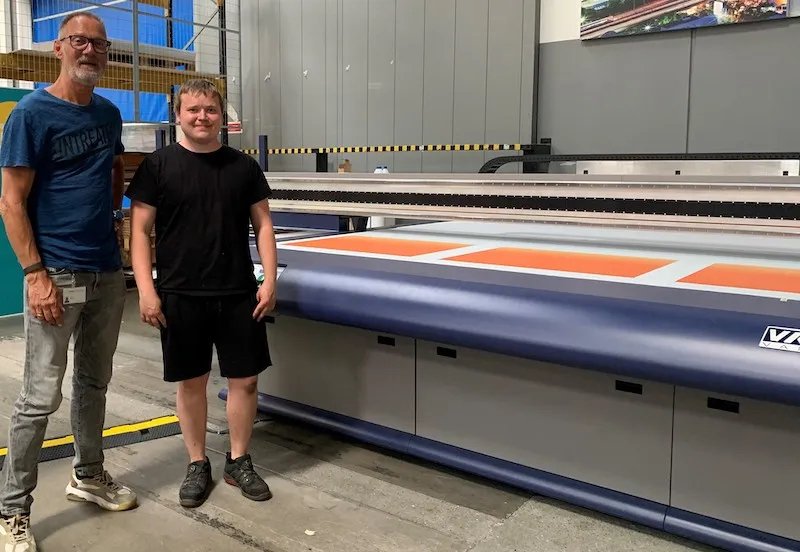 From left: Henrik Mølgaard,Production Manager, with Andreas Balleby, Print Operator, of Stibo Complete with their new Vanguard flatbedPhoto Nessan Cleary