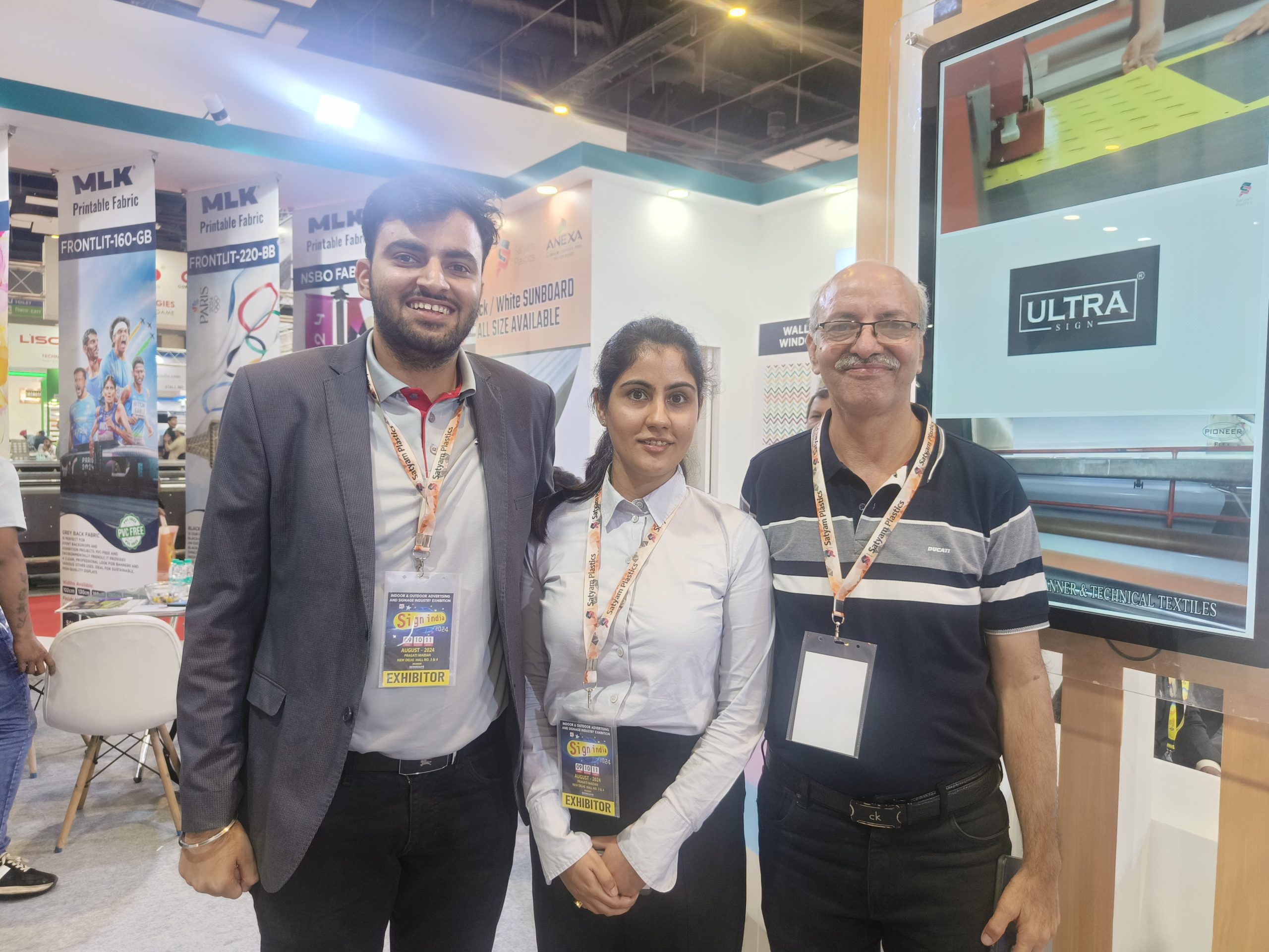 (L–R): Dixit Kalra, director, Purva Dhingra and Rajiv Kalra at the Satyam Plastics stand at Sign India 2024. Photo IP
