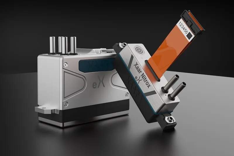 The eX heads with cylindrical and prismatic battery cells for scale. Photo Xaar