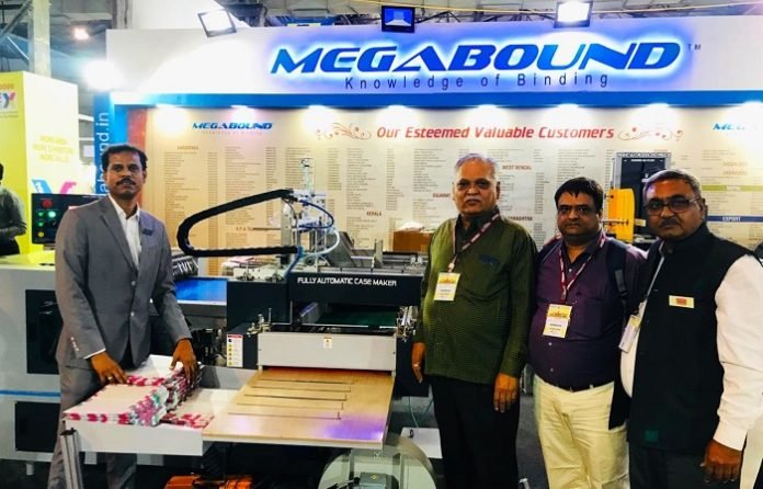 Mr N Srinivasa Reddy (left) with valued customers at PRINTPACK INDIA 2022 Megabound