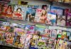 Don’t write off the printed magazine London, United Kingdom- 14 August 2011 – UK Magazines of different topics on the shelf of a newsstand in a bus station Photo Zozobela iStock