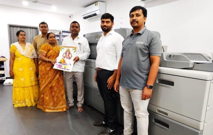 Mr Gudivada Ravikumar & son Mr Gudivada Saiprakash (3rd & 5th from right) with othe family members and the team Monotech Systems Limited alongside RICOH Pro C9500 Sri