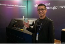 At Fespa, Roland DG shows off new direction Kohei Tanabe, CEO of Roland DG, with a glass printed on the RC300.